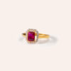Elegant 18k gold ruby ring featuring a vibrant crimson ruby centerpiece, accented with sparkling diamonds, designed for timeless sophistication and modern versatility.